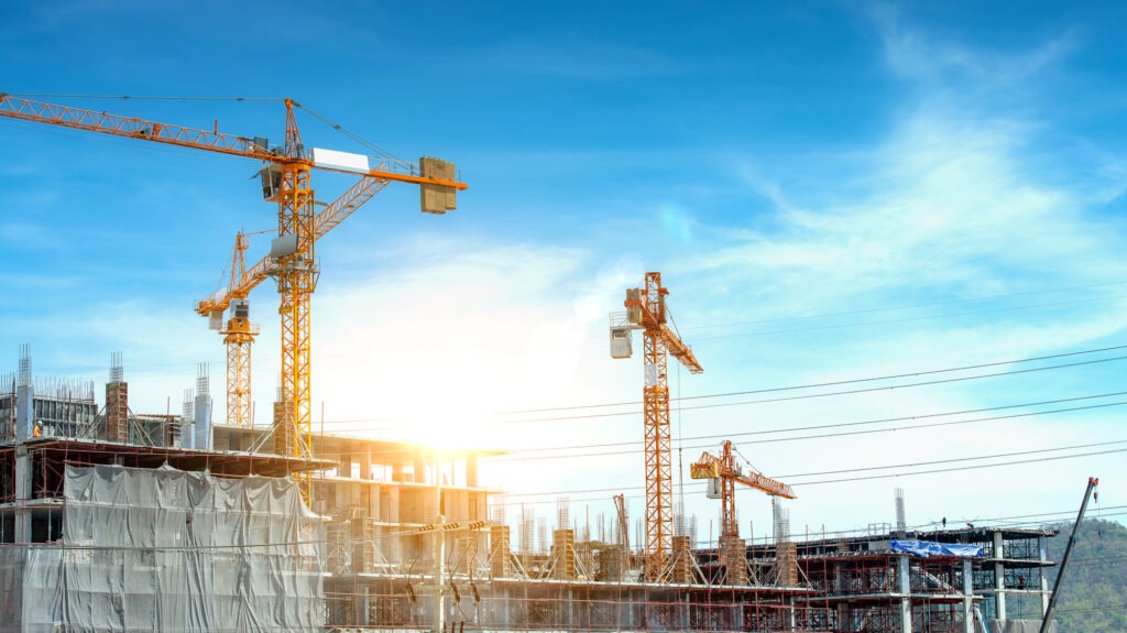Lots of tower Construction site with cranes and building with blue sky background