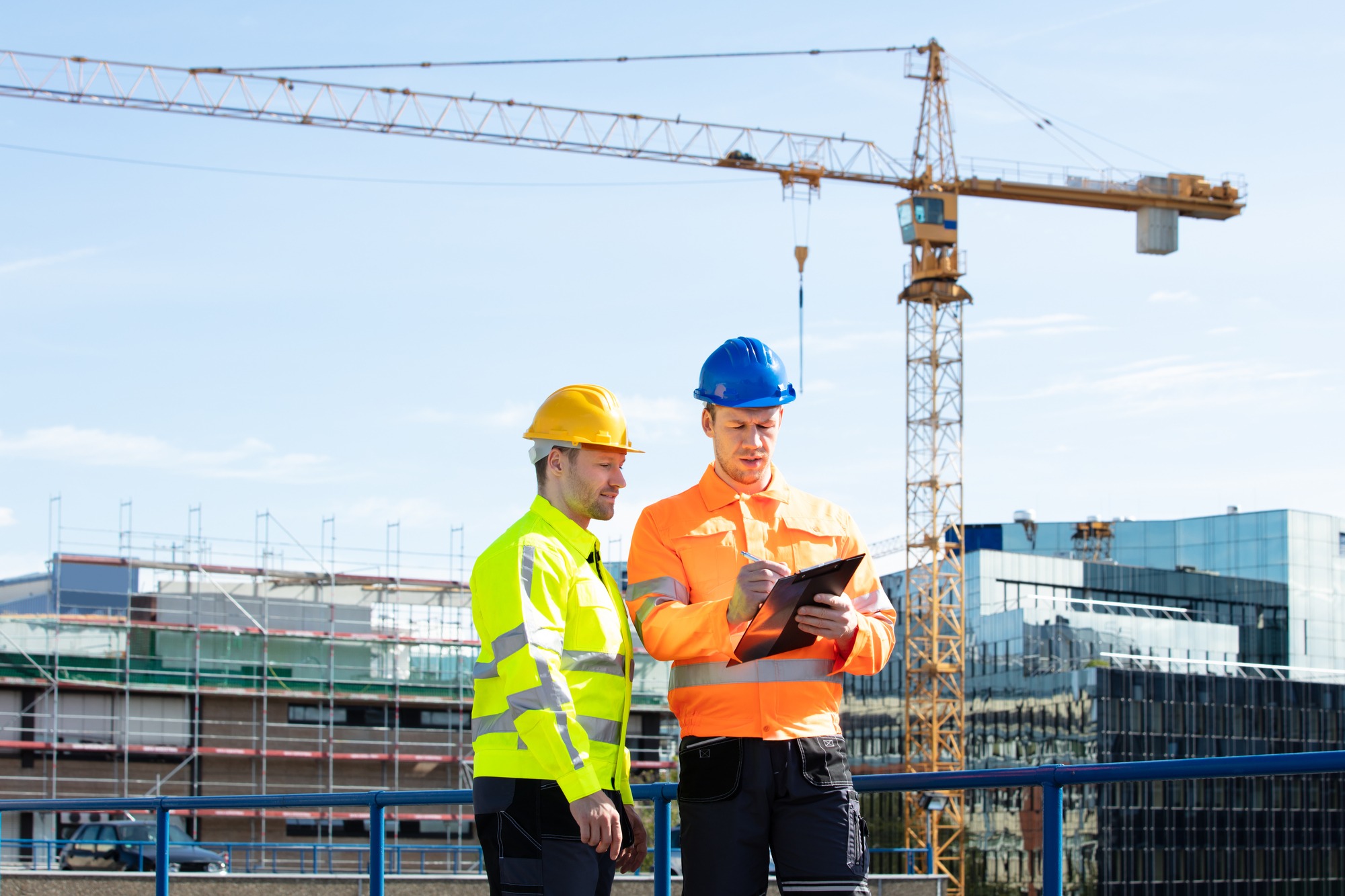 Male Architect Giving Instructions To His Foreman